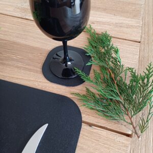 Zwarte onderzetter in leer